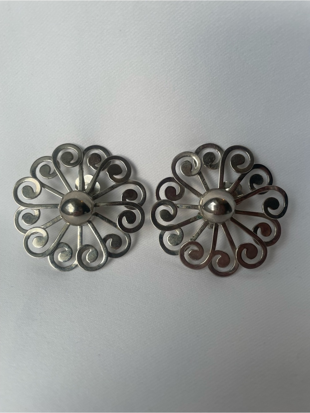 Vintage silver tone clip earrings large flower scroll disc 60s comfortable backs
